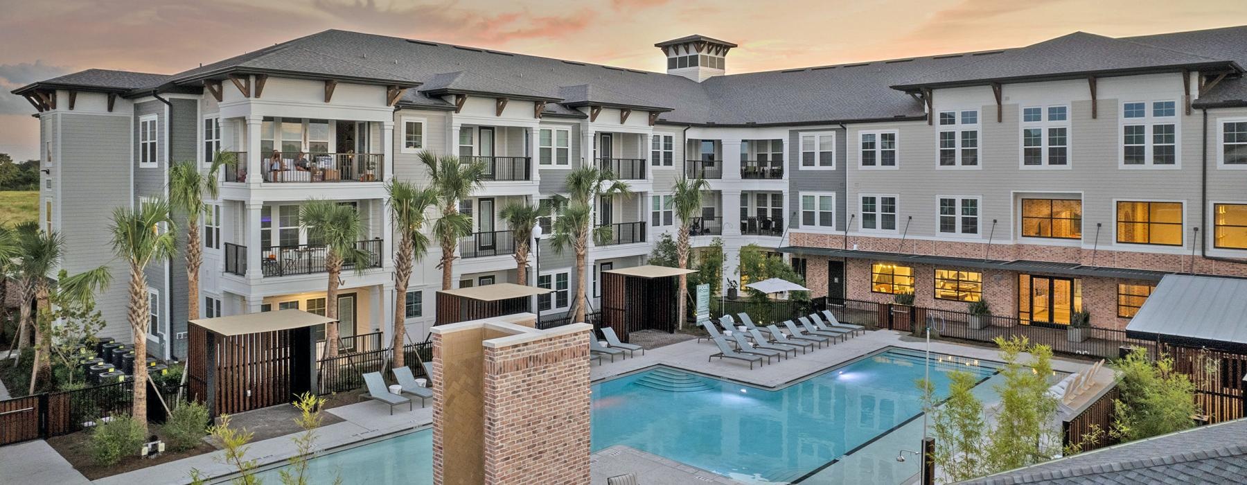 a building with a pool in front