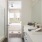 a bathroom with a tub and sink