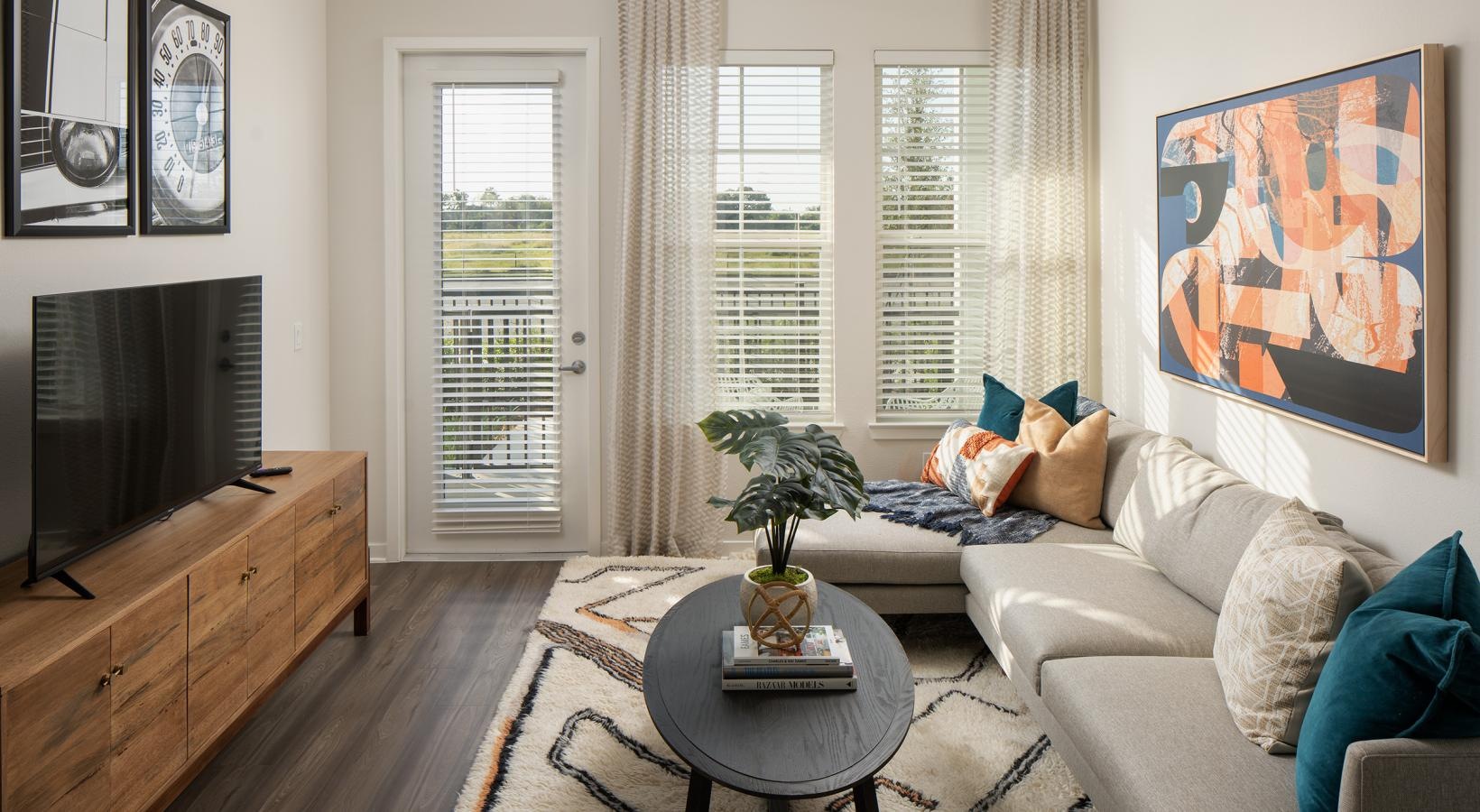 Settle into comfort at Vida Winter Garden a living room with a couch and a coffee table