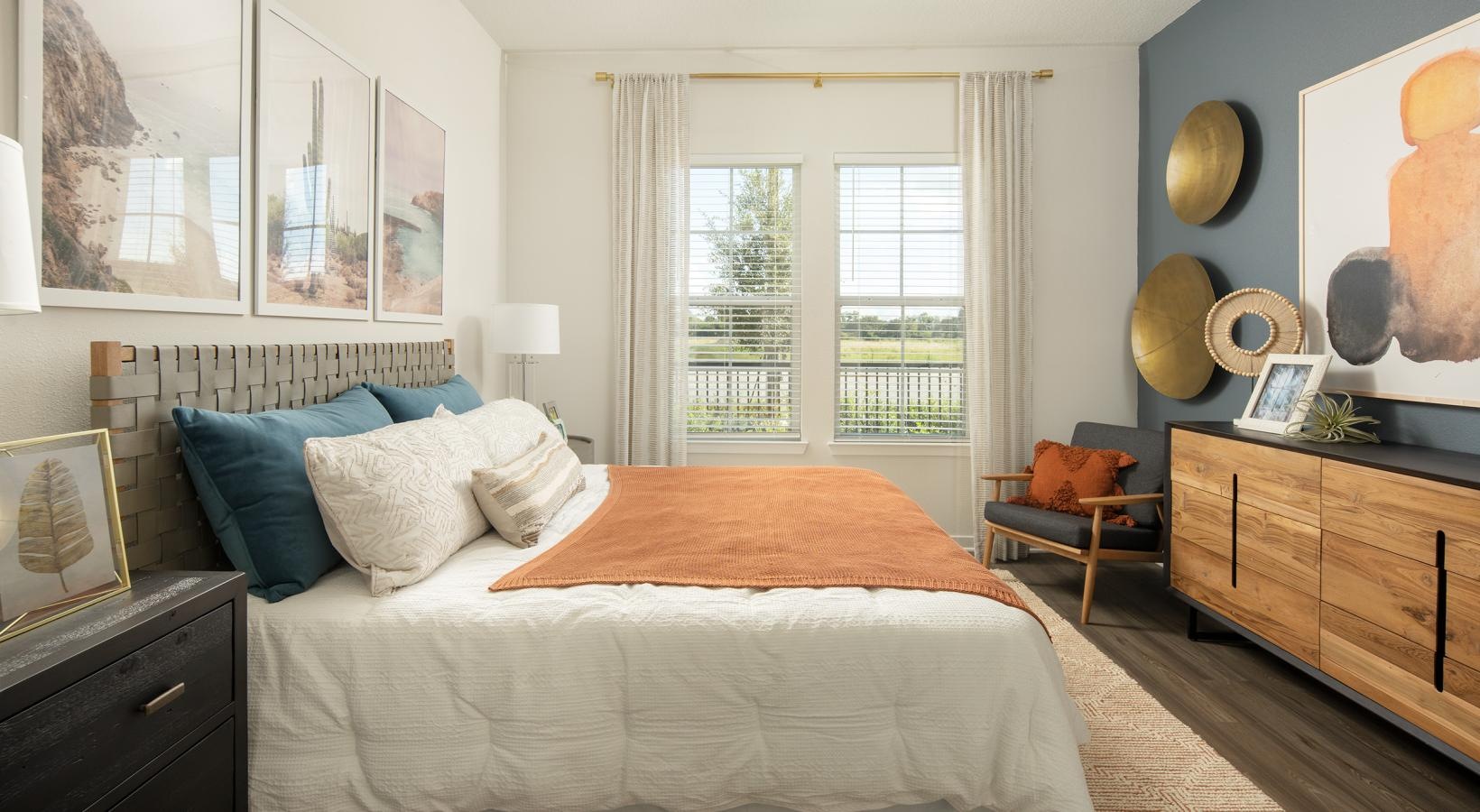Sleep in style a bedroom with a bed and a chair