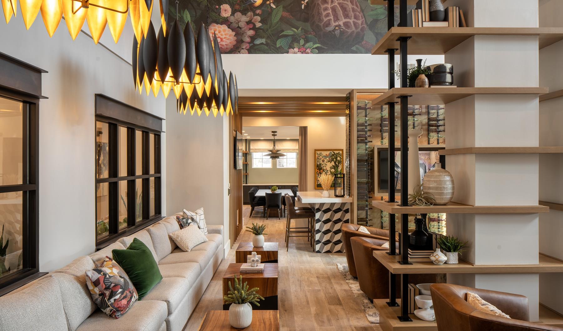 a living room with a chandelier and a couch